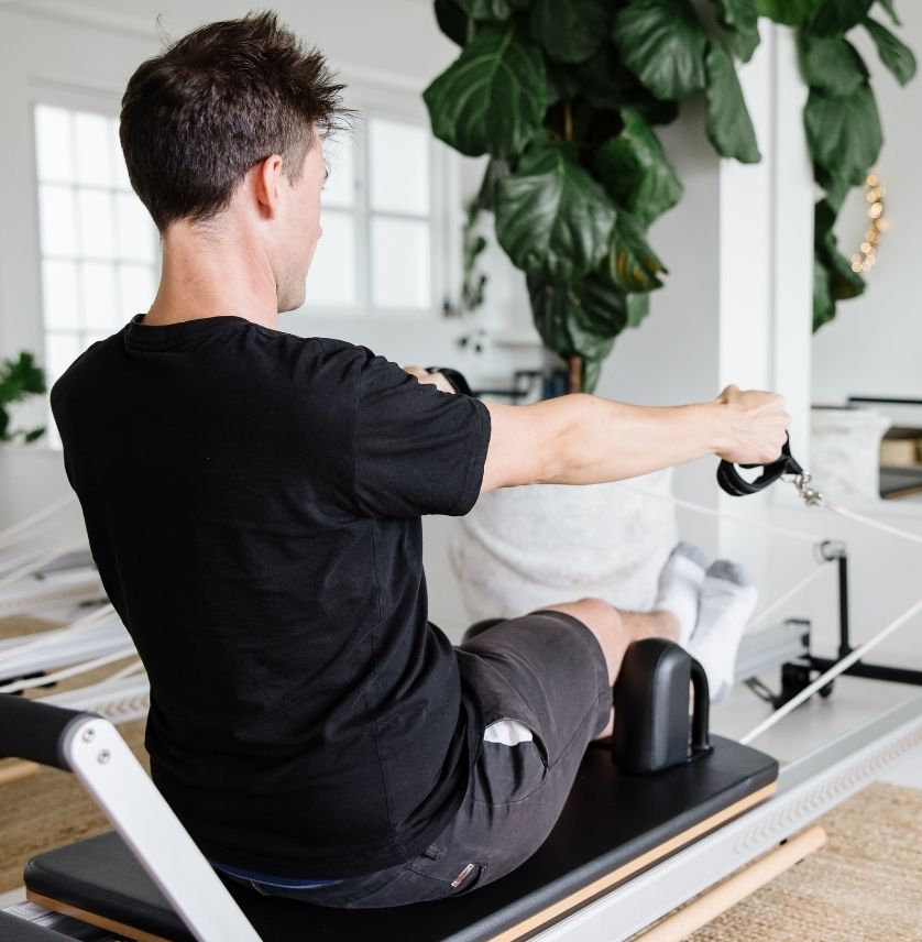 Guys do Pilates at ONFORM