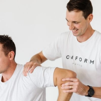 ONFORM Physio assessing shoulder